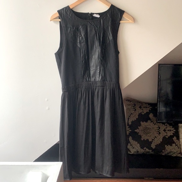 Simple black dress with leather front - Picture 1 of 2